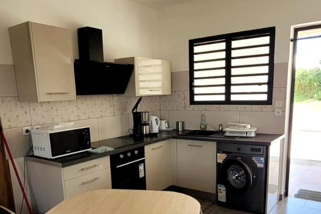 Appartement Ti coin jardin à La Paix Extérieur photo